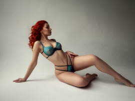 Curvy redhead in lingerie (click to view)