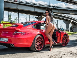 Hot butt bikini babe and Porsche (click to view)